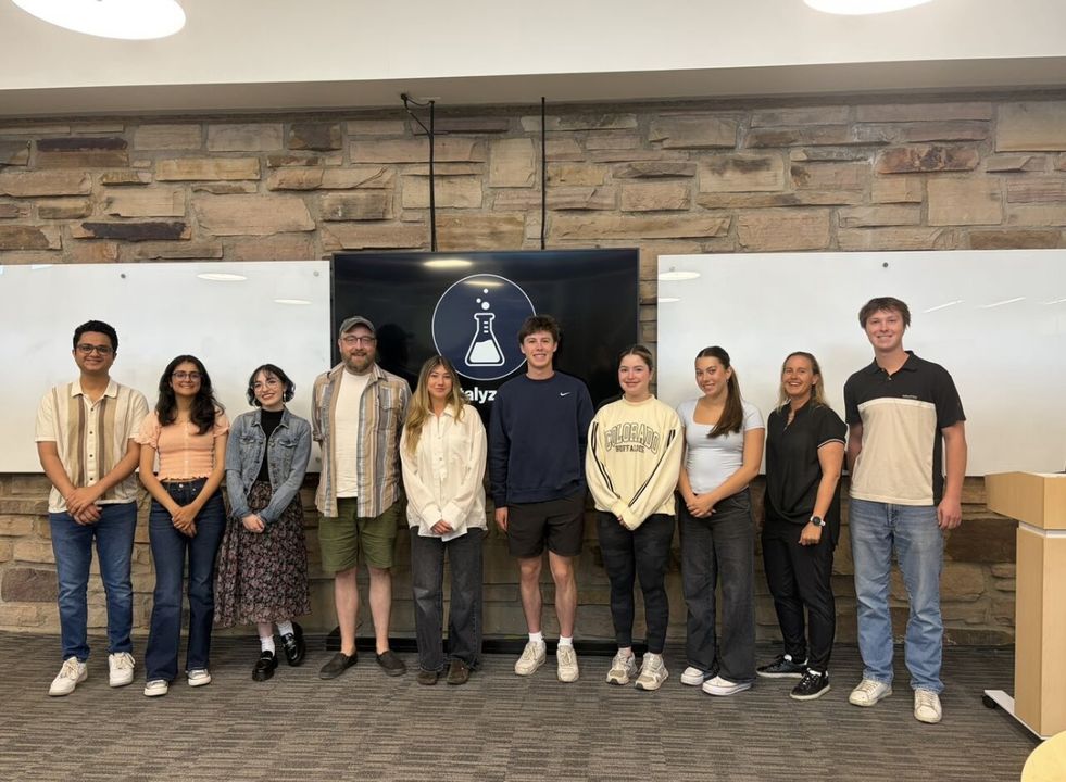 Catalyze CU cohort in front of the Catalyze logo